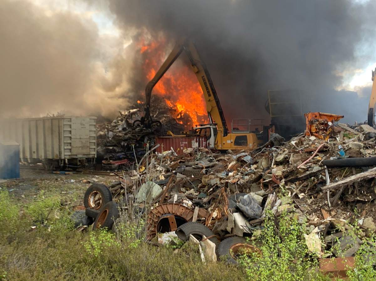Crews battle a fire at Dartmouth Metals Ltd. in Burnside Friday afternoon.