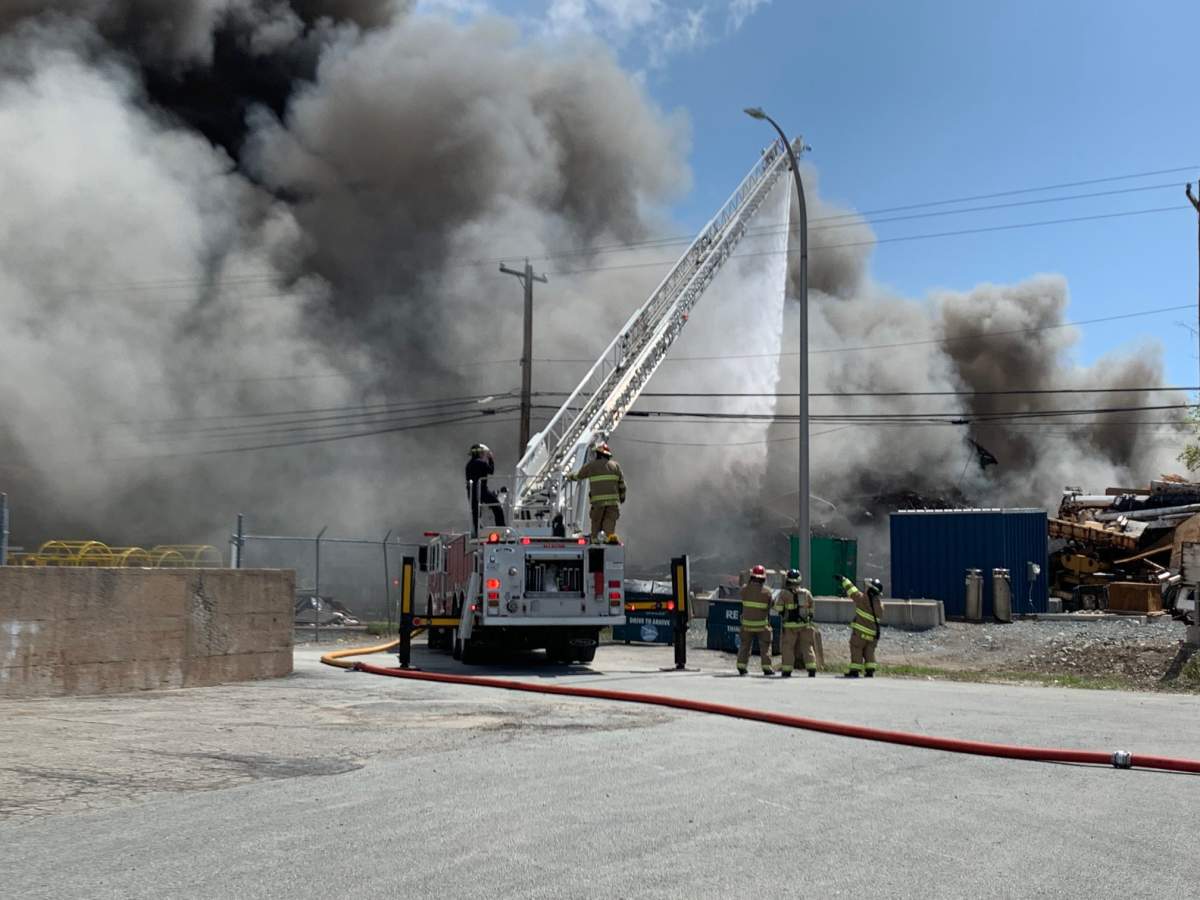 Crews were able to prevent the fire from spreading to the Dartmouth Metals Ltd. building.
