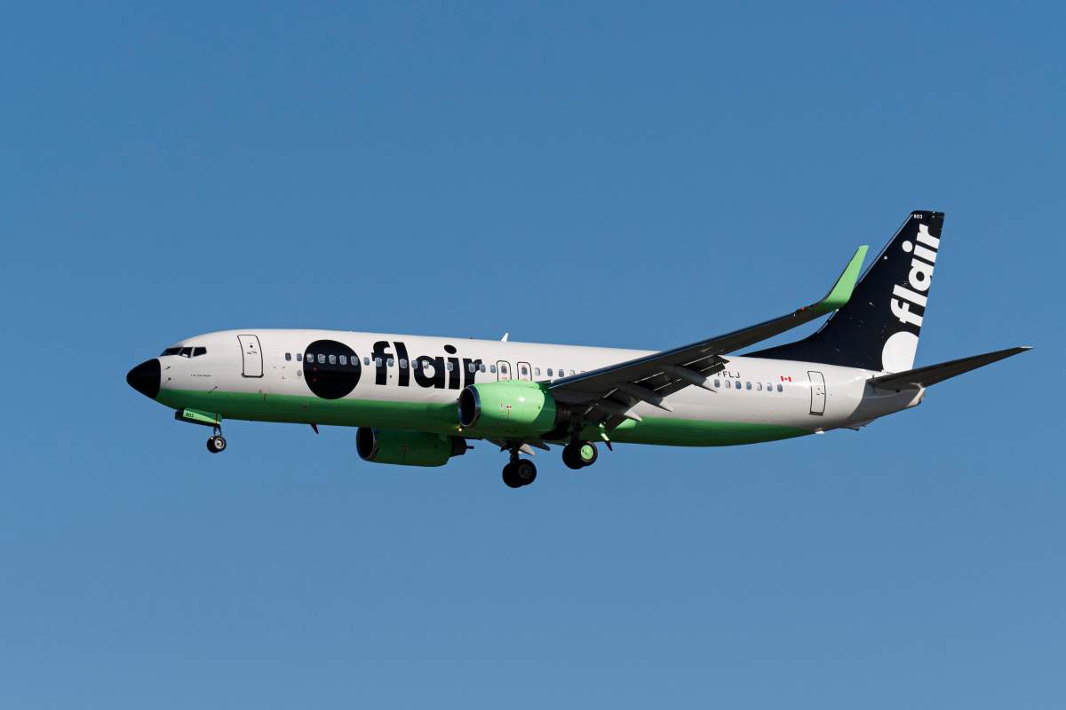 A Flair Airlines Boeing 737-800 (C-FFLJ) single-aisle jetliner on short final approach for landing at Vancouver International Airport, Richmond, B.C. on Monday, September 30, 2019.