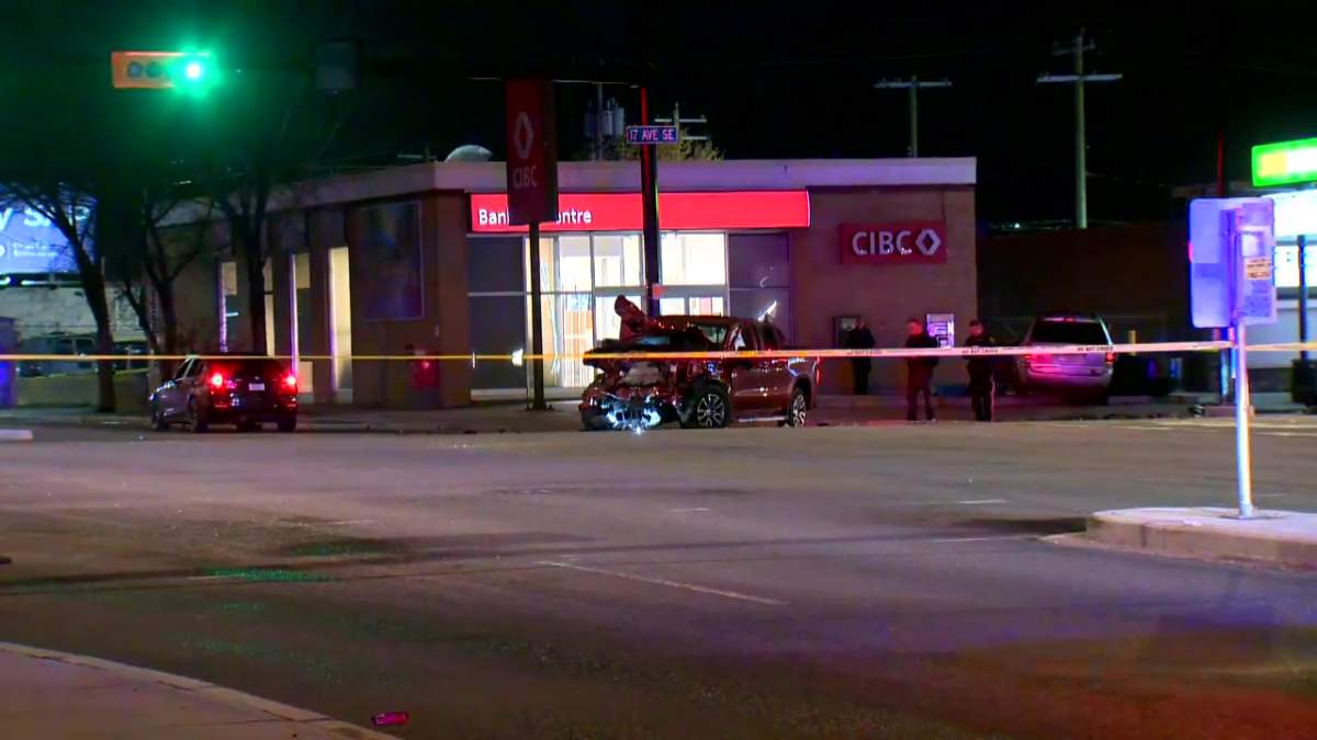 Calgary police closed off the intersection of 17 Avenue SE and 36 Street SE after a shooting and collision on May 11, 2022.