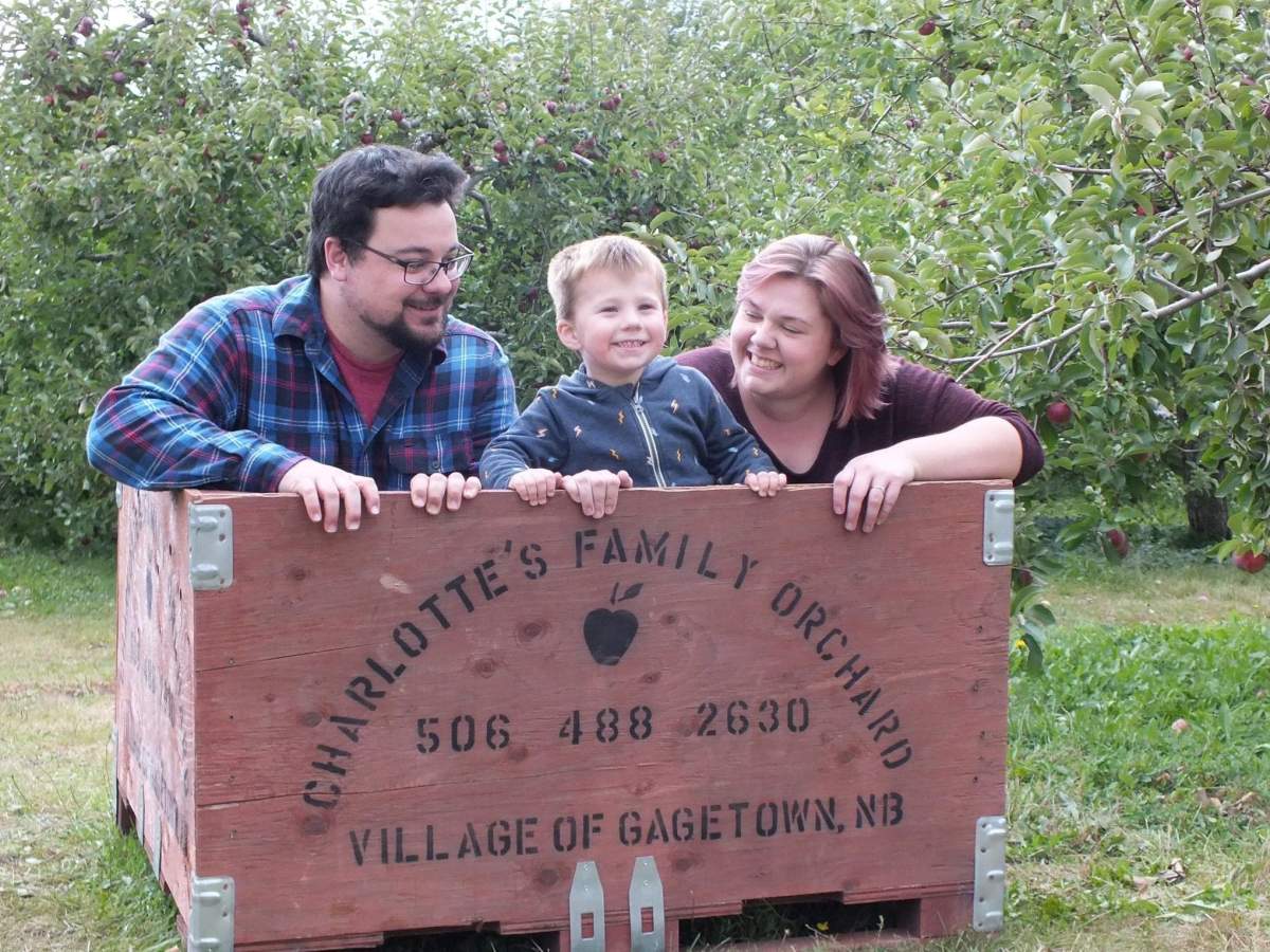 Green is seen with her husband and son.
