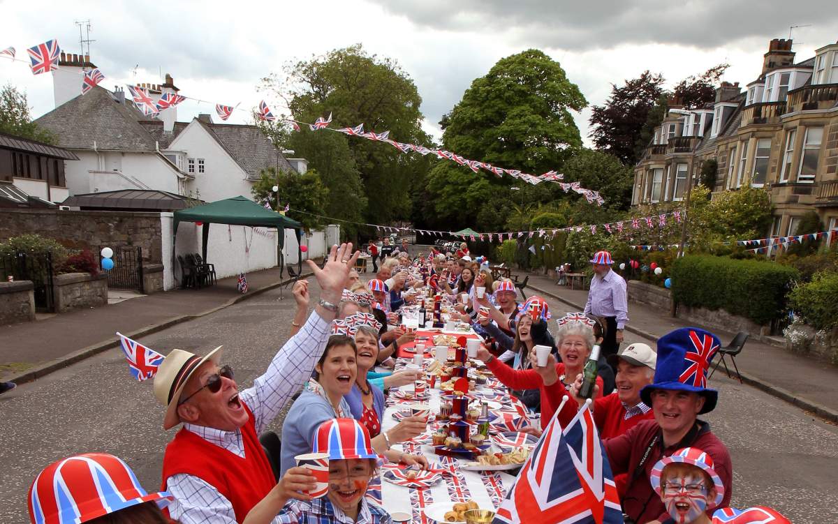 A file photo shows residents of Murrayfield Drive in Edinburgh, sitting down to a Jubilee street party.