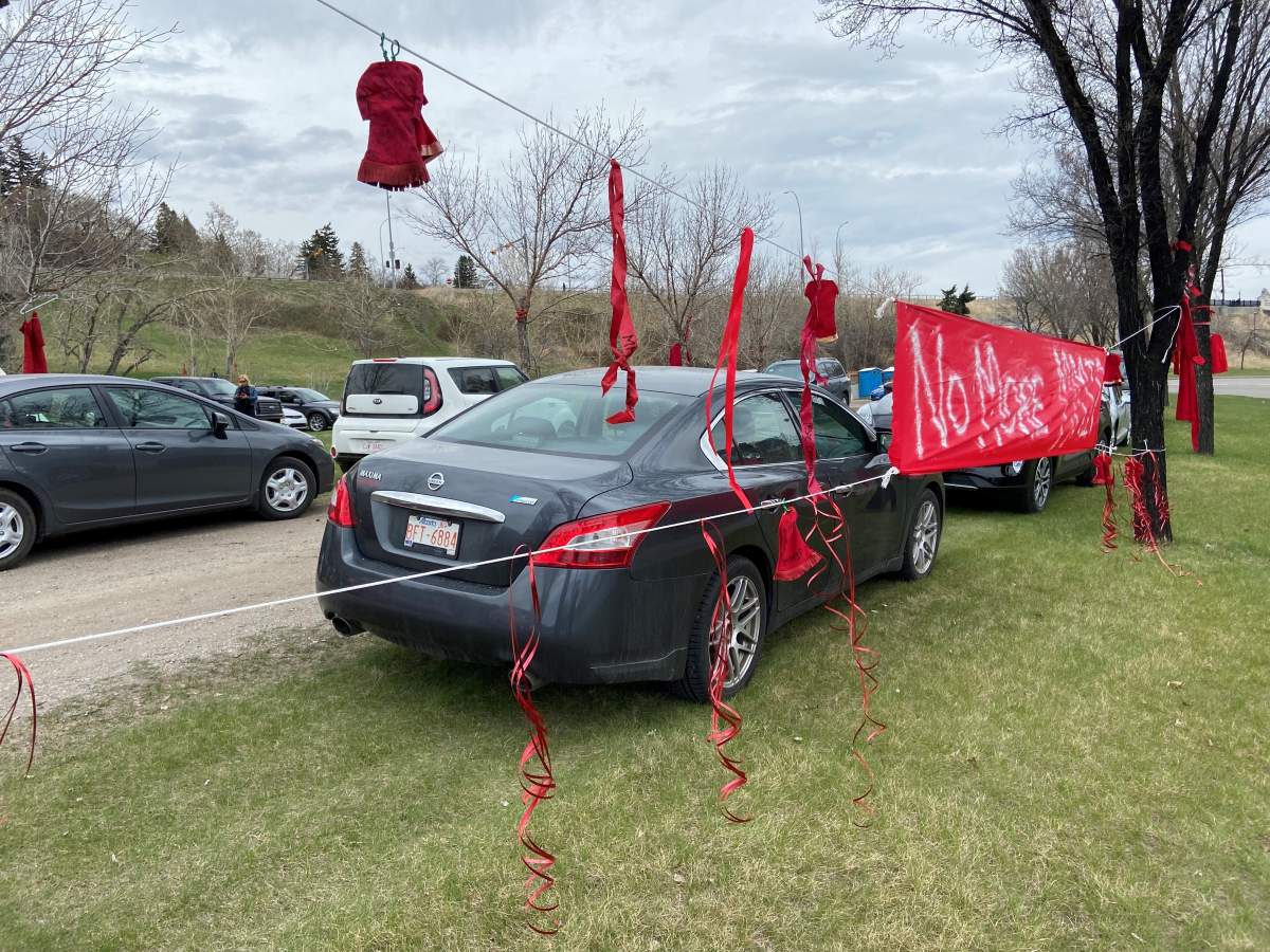 Signs at Red Dress ceremony.