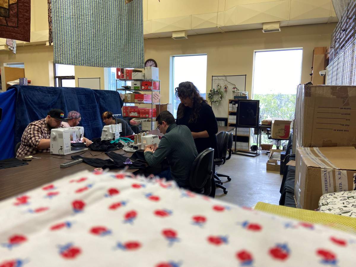 Group working on garments.
