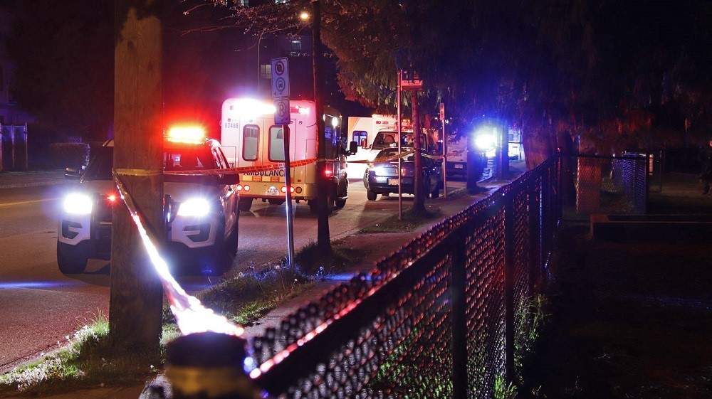 Police and paramedics at the scene of an incident in Coquitlam early Sunday morning. 