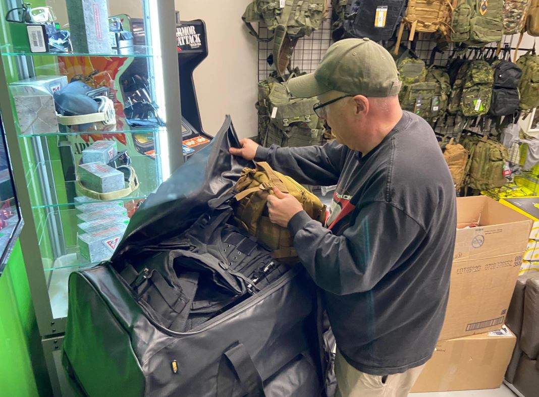 Dave Bryenton packing supplies for Ukraine in Edmonton on May 10, 2022.