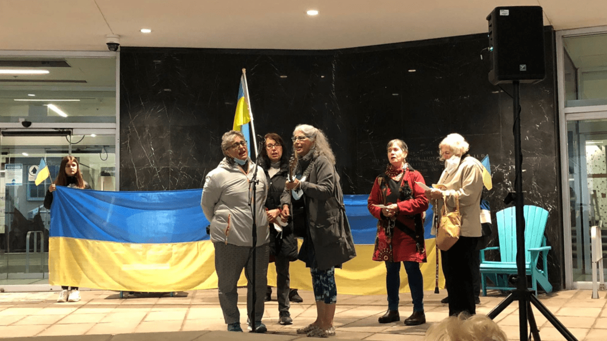 Supporters at a vigil for Ukraine at Hamilton City Hall on May 18, 2022.
