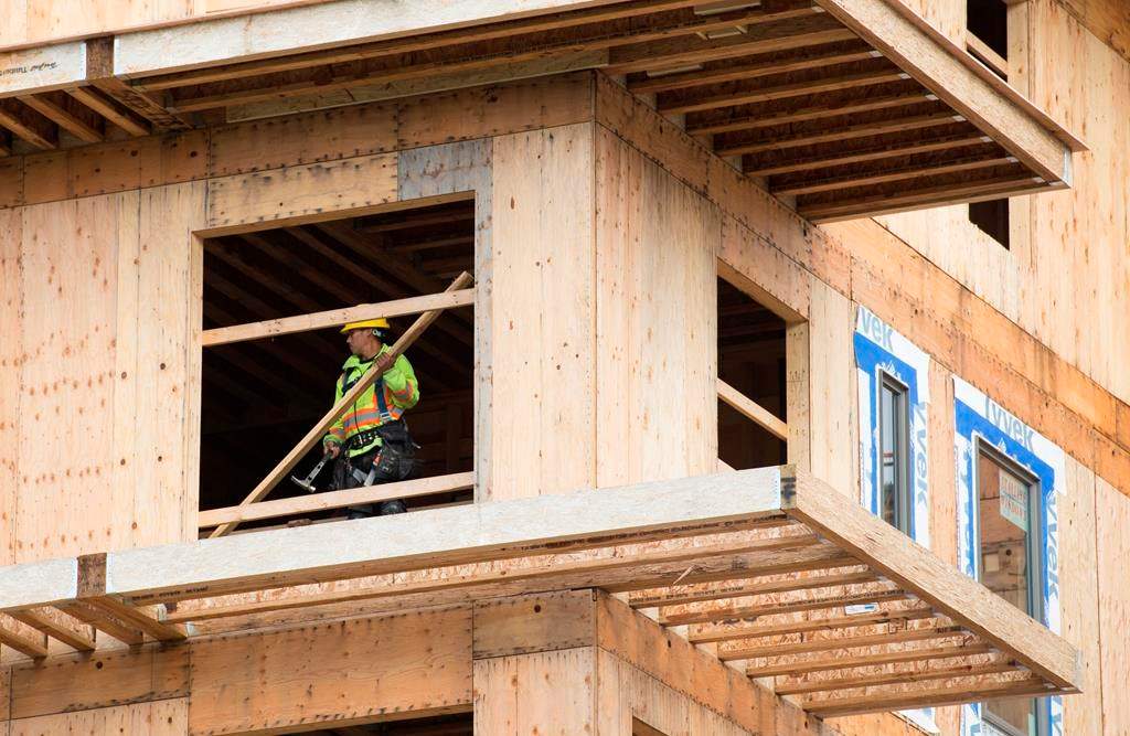A worker is seen working on a construction project in Vancouver on April 23, 2019.  
