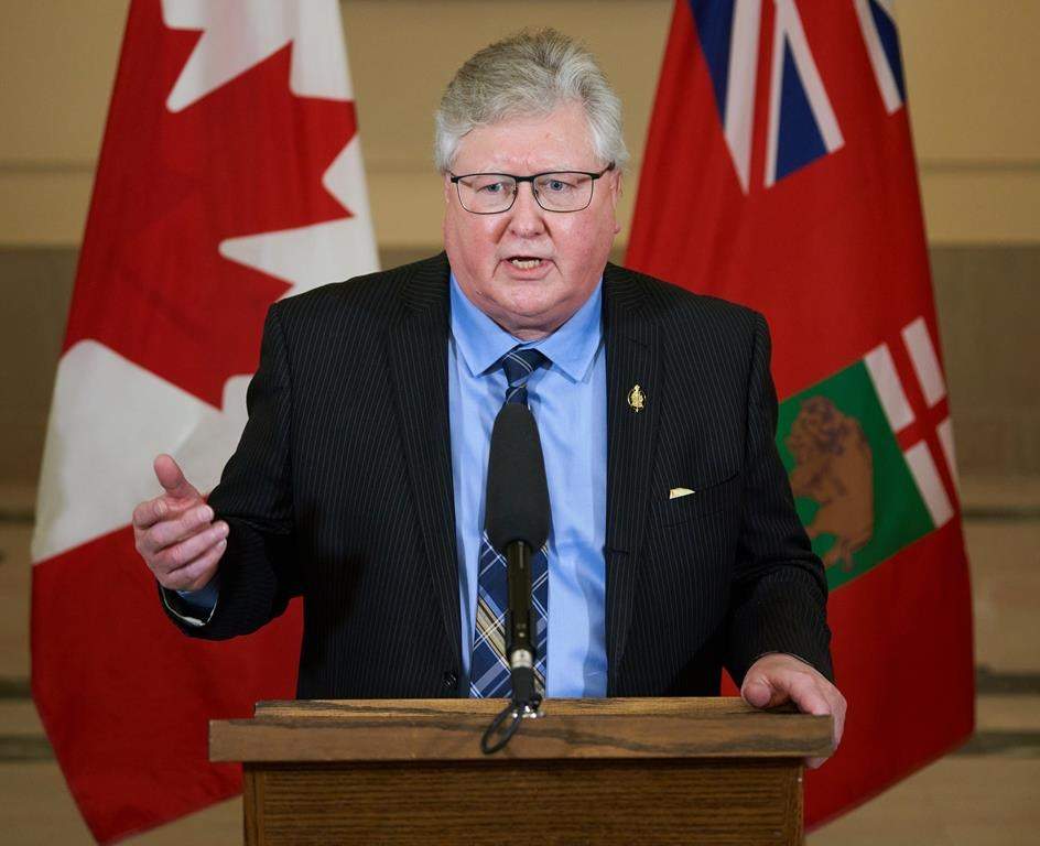 Seniors and Long-Term Care Minister Scott Johnston speaks to the media at a press conference at the Manitoba legislature in Winnipeg, Manitoba, Tuesday, Jan. 18, 2022. THE CANADIAN PRESS/David Lipnowski.
