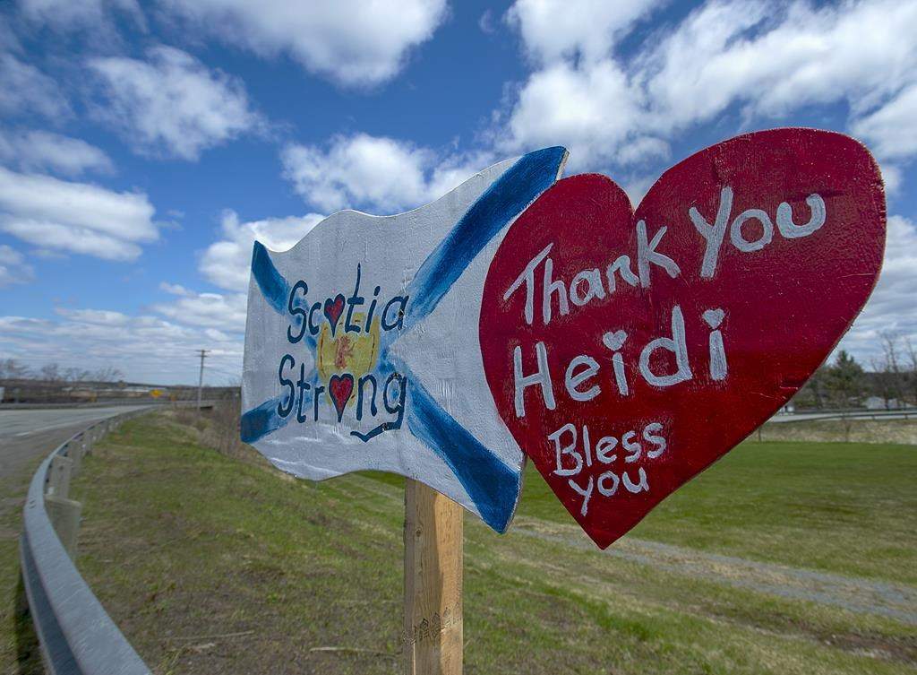 A memorial pays tribute to RCMP Const. Heidi Stevenson, a 23-year member of the force and mother of two, along the highway in Shubenacadie, N.S., on Thursday, May 14, 2020. THE CANADIAN PRESS/Andrew Vaughan