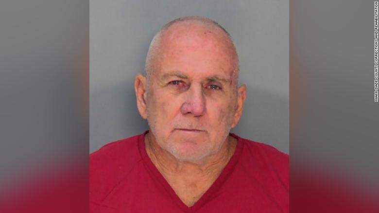 Robert Koehler is pictured in a mugshot wearing a red shirt. He has been charged in six sexual assault cases in Broward County, Florida, officials announced Tuesday.