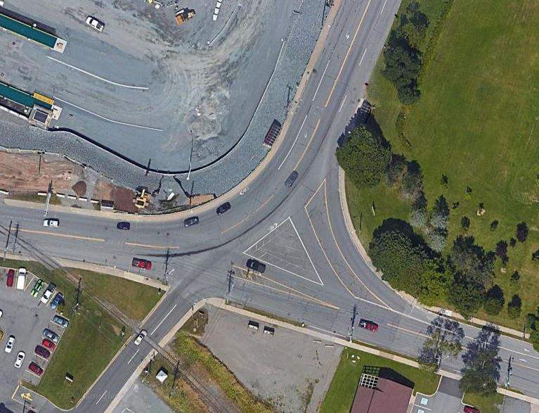 Four roads form Simms Corner. Clockwise from top: Bridge Street, Lancaster Avenue, Fairville Boulevard and Main Street West.