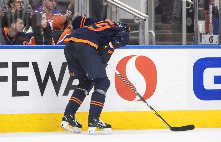 Edmonton Oilers’ Leon Draisaitl (29) is injured during second period NHL conference finals action against the Colorado Avalanche, in Edmonton on Monday, June 6, 2022.
