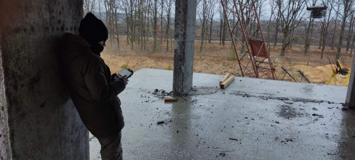 Andrii Pokrasa, 15, with his drone outside Kyiv, Ukraine.
