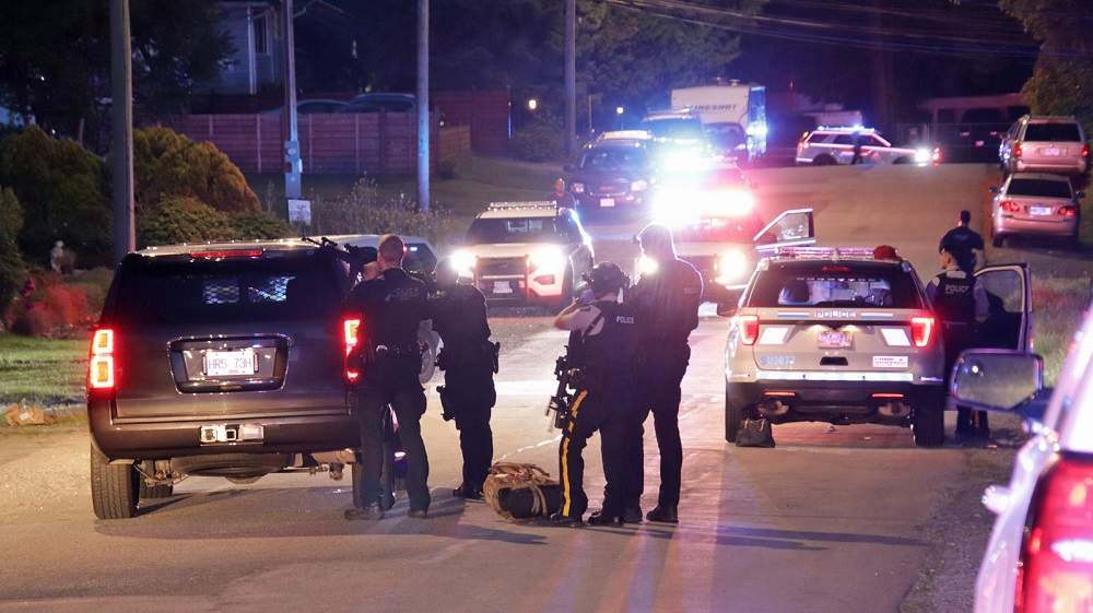 A large police presence could be seen outside a home near 128A street in Surrey Thursday night. 