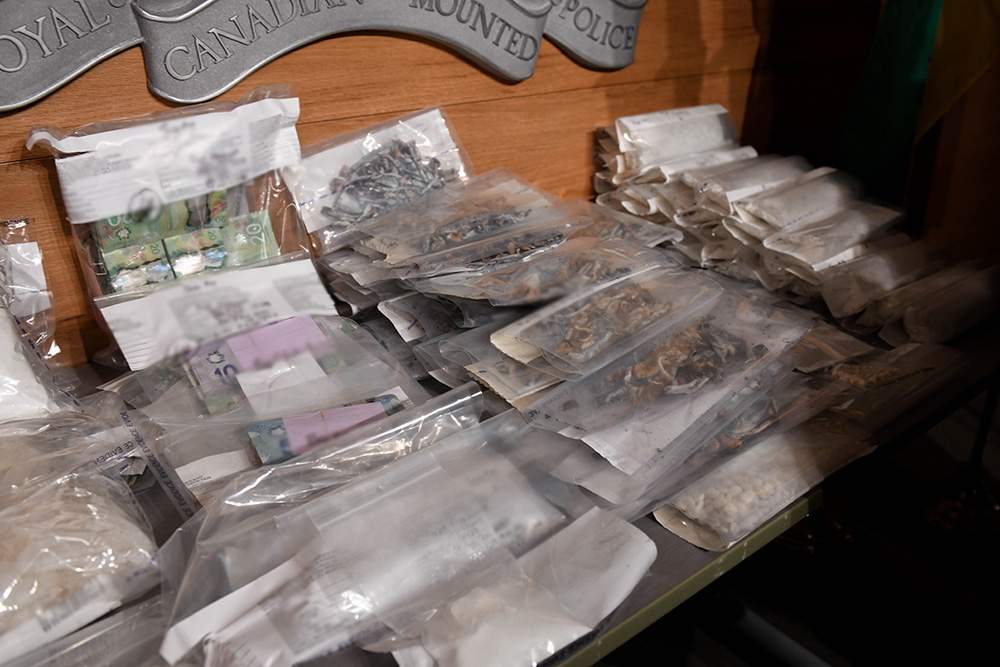 A drug trafficking investigation involving a crime group that was distributing large quantities of drugs across Saskatchewan and Alberta has resulted in 70 criminal charges being laid by police.