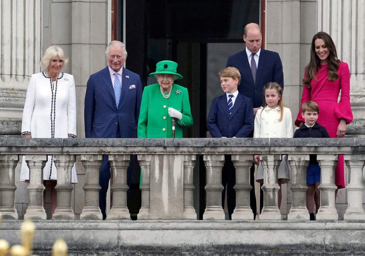 Camilla, Duchess of Cambridge, Prince Charles, Prince of Wales, Queen Elizabeth II, Prince George of Cambridge, Prince William, Duke of Cambridge, Princess Charlotte of Cambridge, Prince Louis of Cambridge and Catherine, Duchess of Cambridge stand on the balcony of Buckingham Palace during the Platinum Jubilee Pageant on Sunday in London, England.