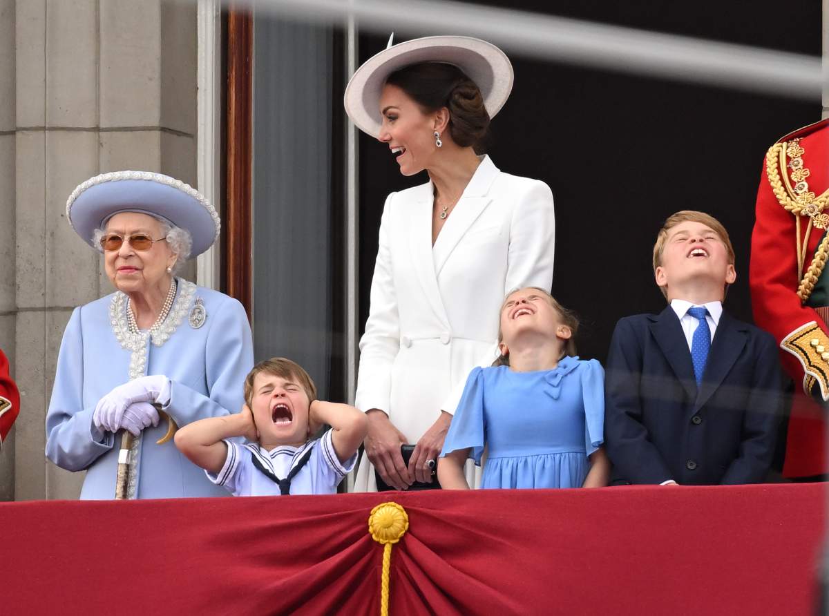 Queen Elizabeth II, Prince Louis, Catherine, Duchess of Cambridge, Princess Charlotte and Prince George during Trooping the Colour on June 02, 2022 in London, England.