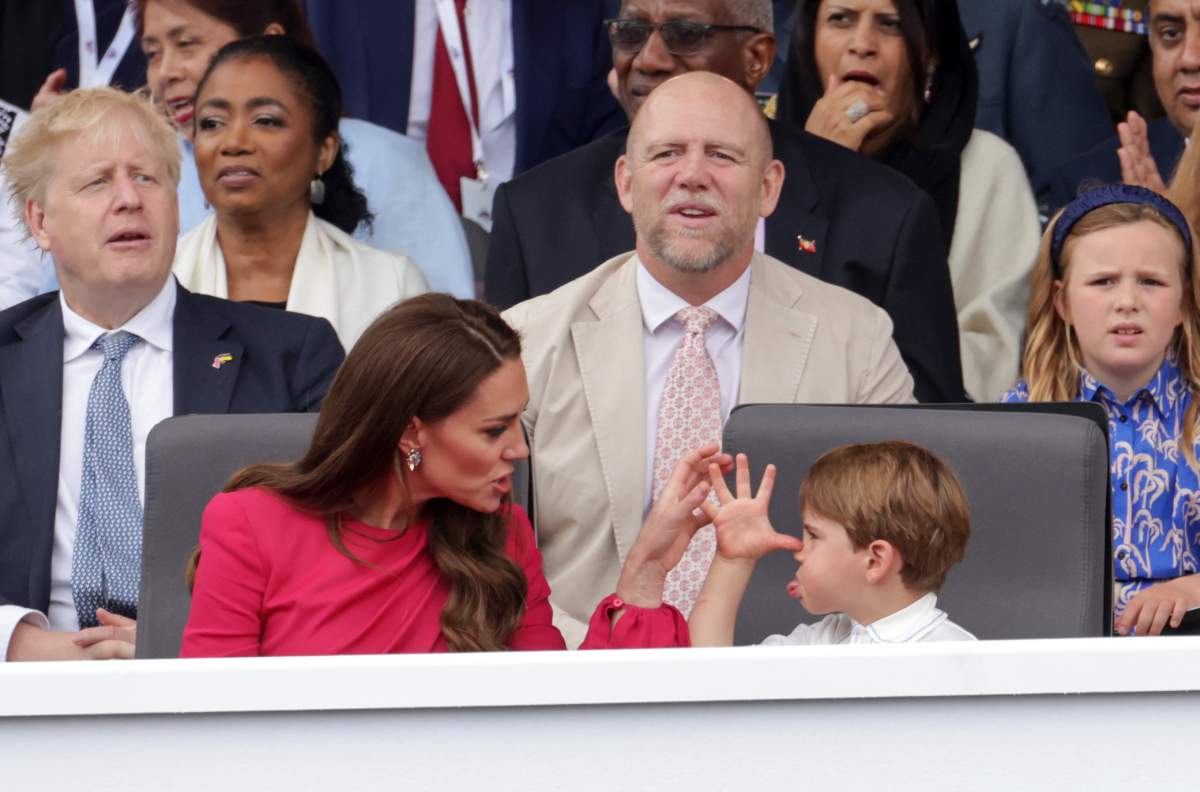 Prime Minister Boris Johnson, Mike Tindall, Mia Tindall (front row) Catherine, Duchess of Cornwall and Prince Louis of Cambridge watch the Platinum Pageant on June 05, 2022 in London, England.