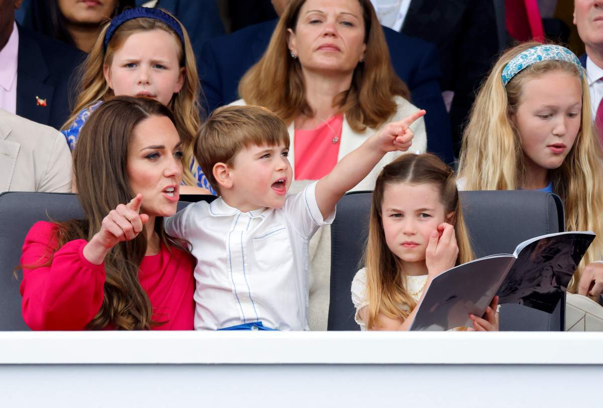 Catherine, Duchess of Cambridge, Prince Louis of Cambridge and Princess Charlotte of Cambridge attend the Platinum Pageant on The Mall on June 5, 2022 in London, England.
