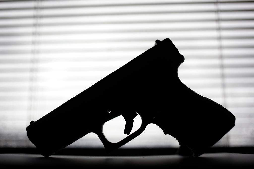A Glock 19 9mm handgun is displayed for a photo in the office of Mad River School District Superintendent Chad Wyen in Dayton, Ohio.