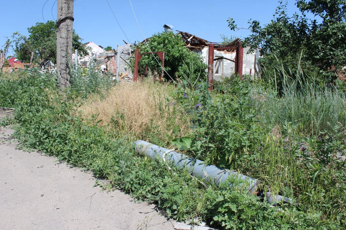 A rocket casing outside the home of Mykola Riiako in Vilkhivka, Ukraine, June 20, 2022.