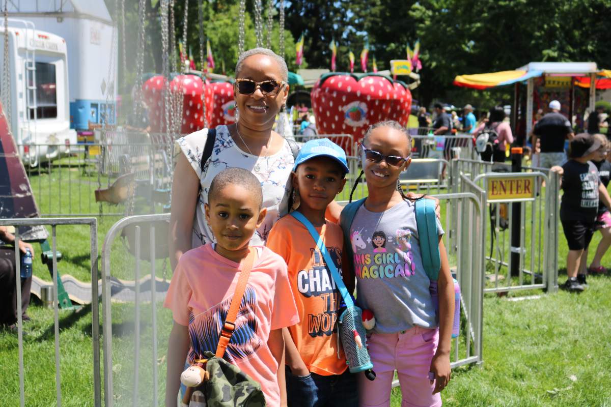 Natalie Cohen with her three children left to right Jonathan, Mathew and Hannah enjoying the London Children’s Festival 2022 in Victoria Park on Friday, June 17, 2022