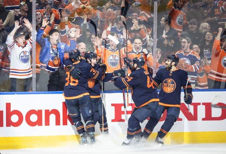 Edmonton Oilers’ Dylan Holloway (36), Ryan Nugent-Hopkins (93), Zack Kassian (44) and Evan Bouchard (75) celebrate a goal against the Colorado Avalanche during second period NHL conference finals action in Edmonton on Monday, June 6, 2022.