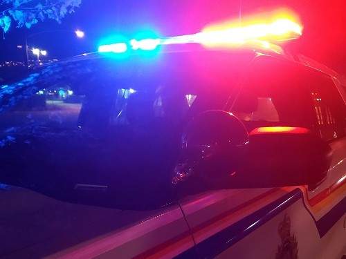 RCMP vehicle with emergency lights on