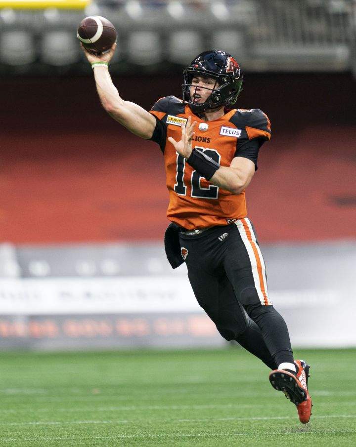 BC Lions’ Nathan Rourke throws a pass against the Toronto Argonauts’ during second half of CFL football action in Vancouver, B.C., Saturday, June 25, 2022.