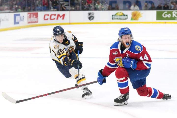 Edmonton Oil Kings’ Carter Souch, right, reacts after deflecting a shot by Shawinigan Cataractes’ Jordan Tourigny during the second period of Memorial Cup hockey action in Saint John, N.B. on Tuesday, June 21, 2022.