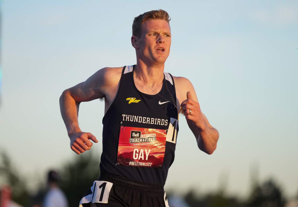 John Gay, of Kelowna, B.C., races to a first-place finish during the men’s 3,000 metre steeplechase event at the Canadian Track and Field Championships in Langley, B.C., on Friday, June 24, 2022.