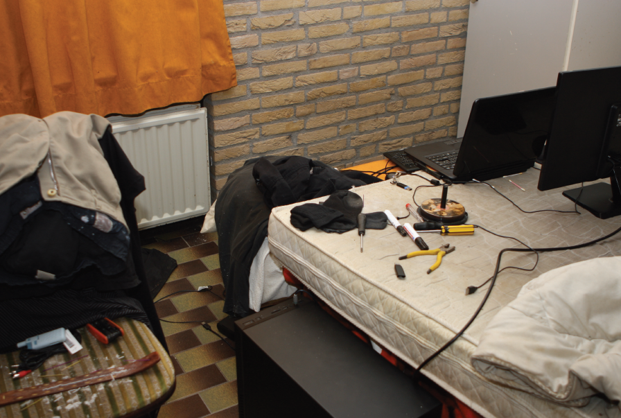 The master bedroom of the bungalow, where investigators seized a desktop and laptop computer which were both powered on at the time of his arrest.