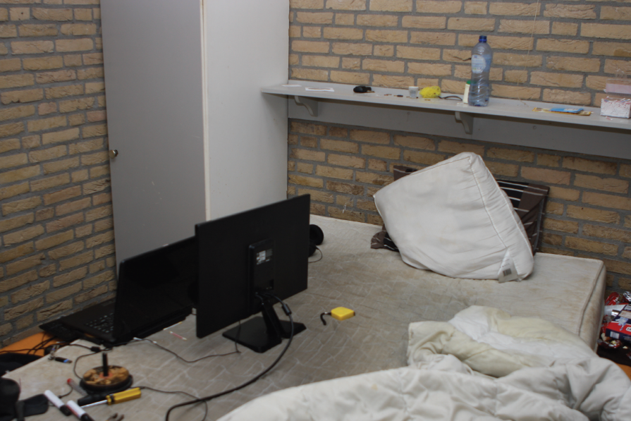 The master bedroom of the bungalow, where investigators seized a desktop and laptop computer which were both powered on at the time of his arrest.
