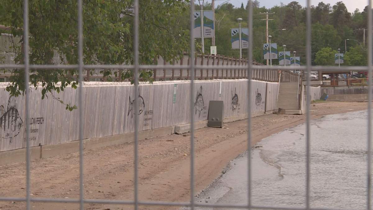 High water levels and strong winds cause the seawall at the West Hawk beach to become unstable and lean towards the lake. 