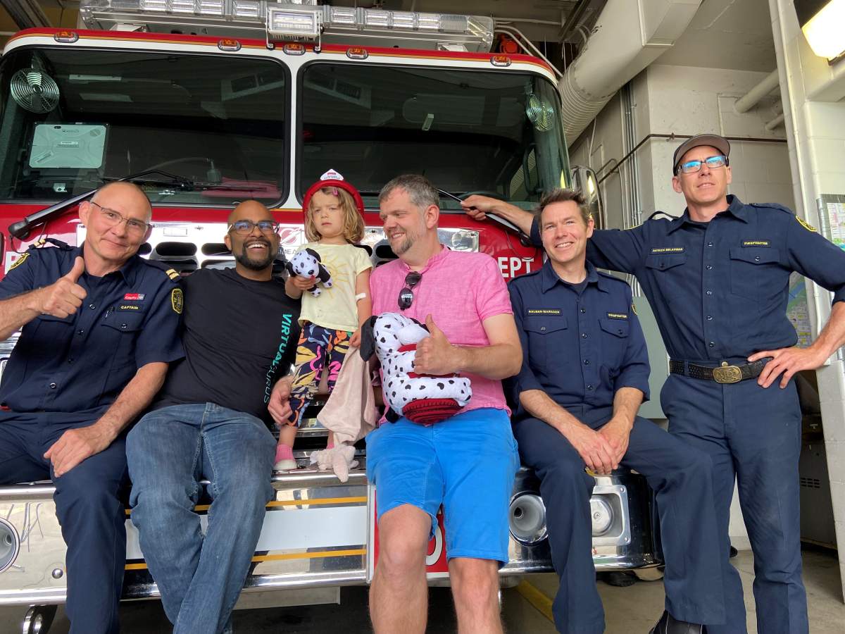Family with fire crew.