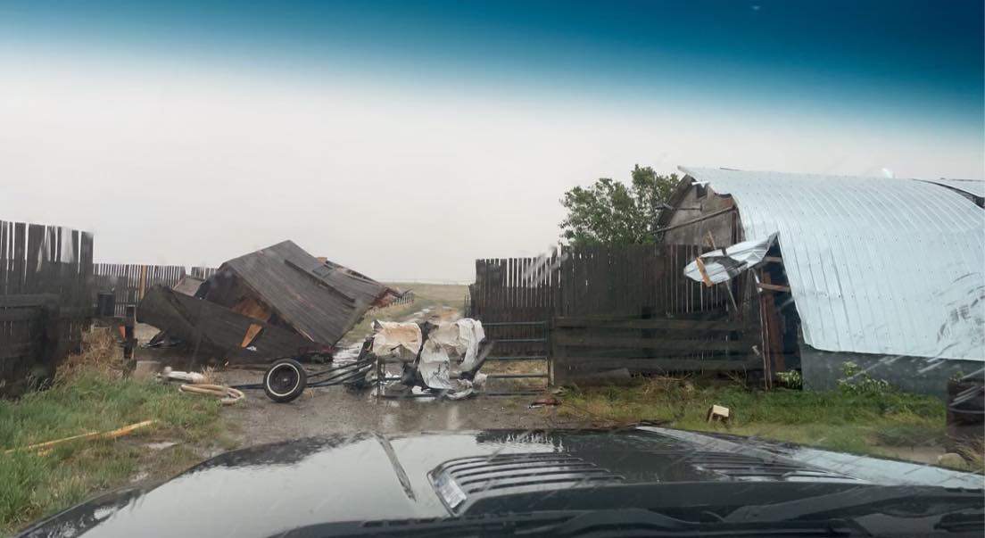 Damage on a farm near Enchant, Alta., is shown following what is suspected to be a funnel cloud on June 6, 2022.