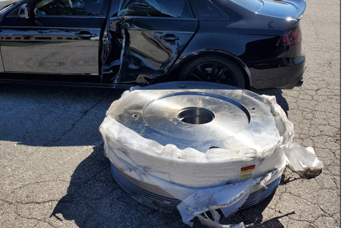 It the rolled across the road, through the opposite lane, before coming to a stop as it hit and damaged a parked car.