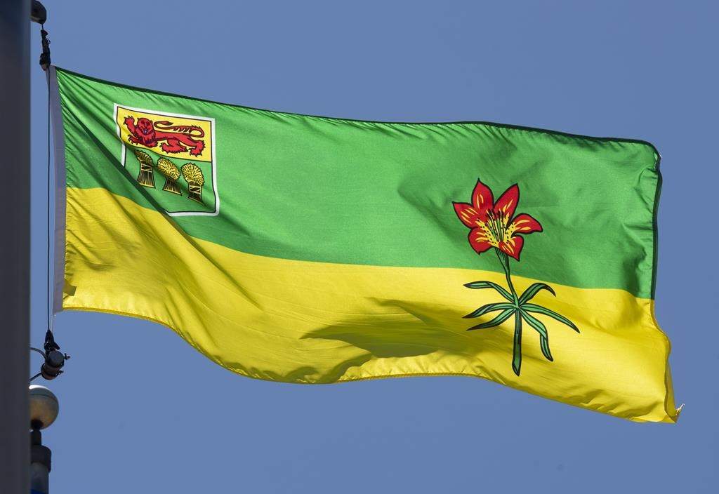 Saskatchewan's provincial flag flies on a flag pole in Ottawa on July 6, 2020. THE CANADIAN PRESS/Adrian Wyld.