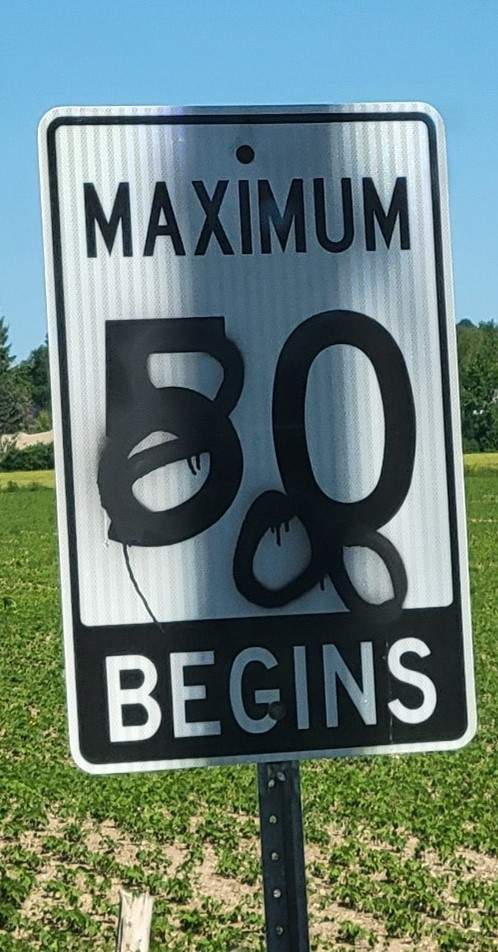 One street sign defaced in Morris-Turnberry, Ont., was spray painted to make it look like an 80 km/h zone rather than a maximum 50 km/h.