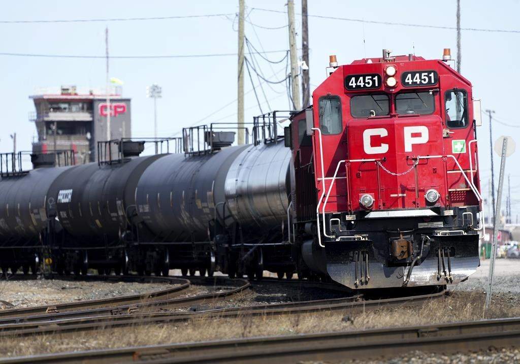 Canadian Pacific Railway trains sit idle on the train tracks due to the strike at the main CP Rail trainyard in Toronto on Monday, March 21, 2022.