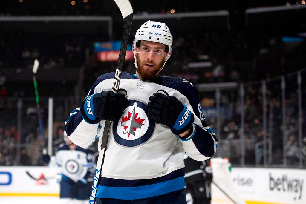 Winnipeg Jets center Pierre-Luc Dubois reacts after scoring a goal in the first period of the team’s NHL hockey game against the Los Angeles Kings on Thursday, Oct. 28, 2021, in Los Angeles.