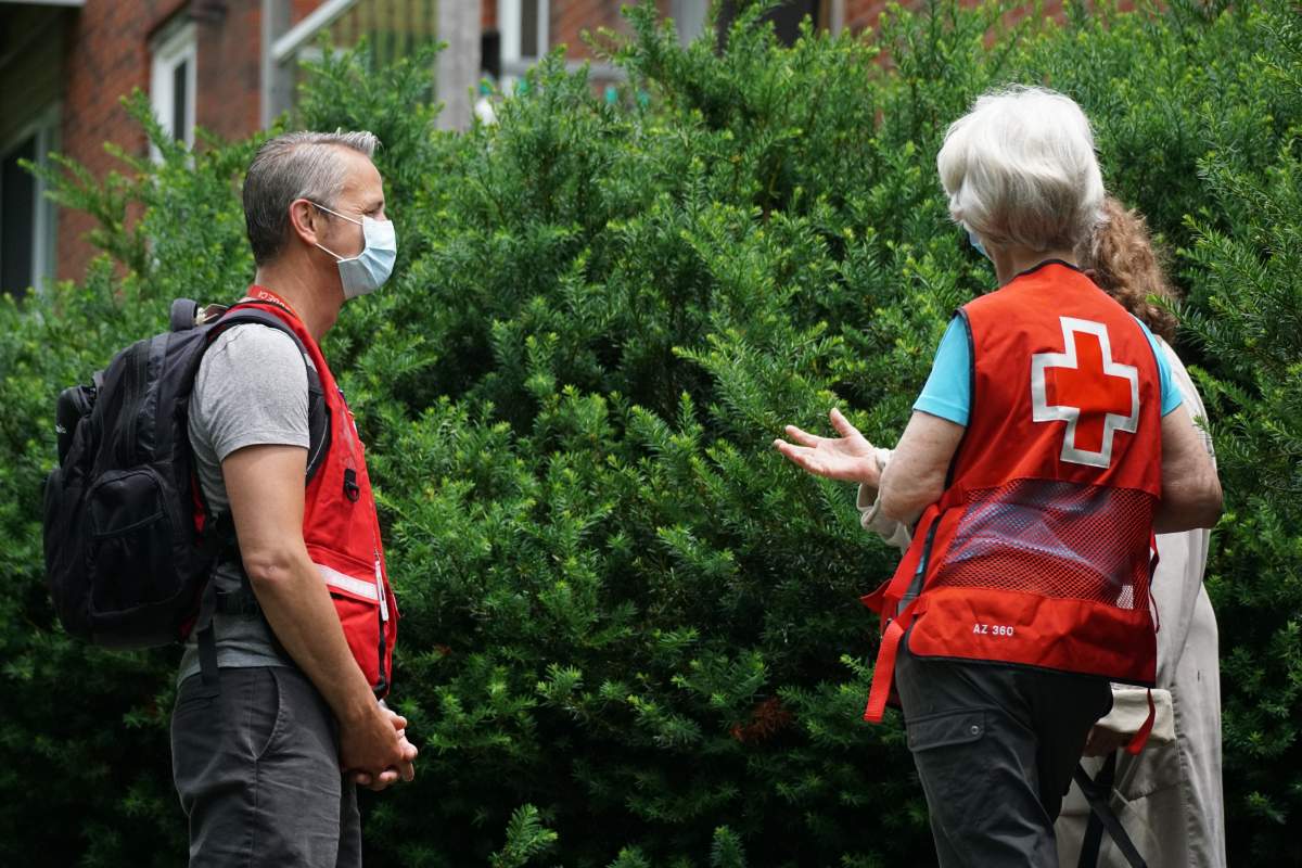 Canadian Red Cross volunteers were at the apartment building on Sunday to assist tenants.