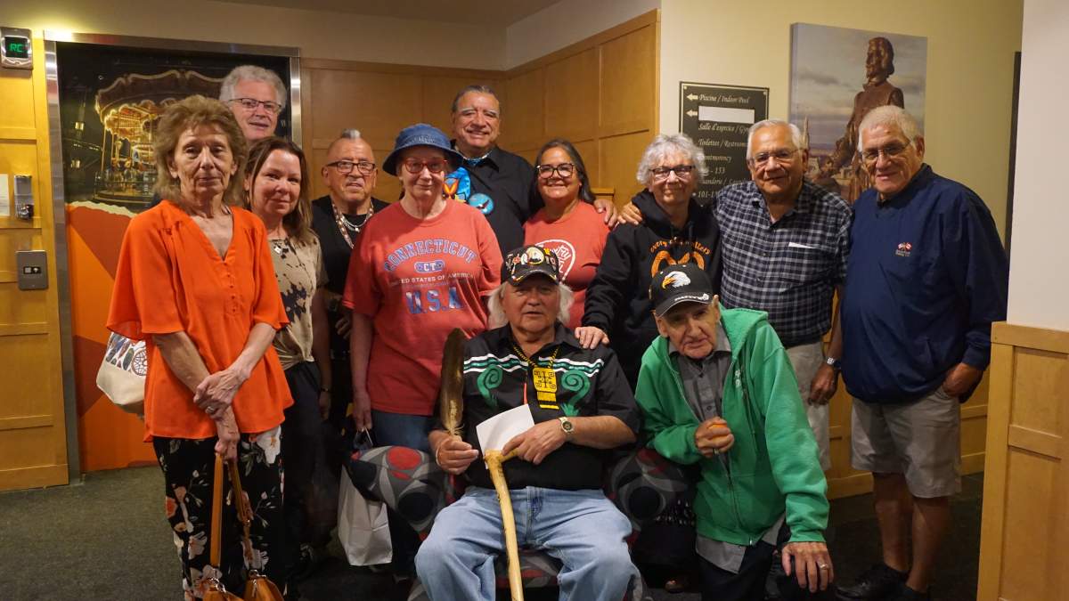 New Brunswick residential school survivors, their families, friends and supporters prepare to attend a mass with Pope Francis in Quebec City on Wed. July 27, 2022.