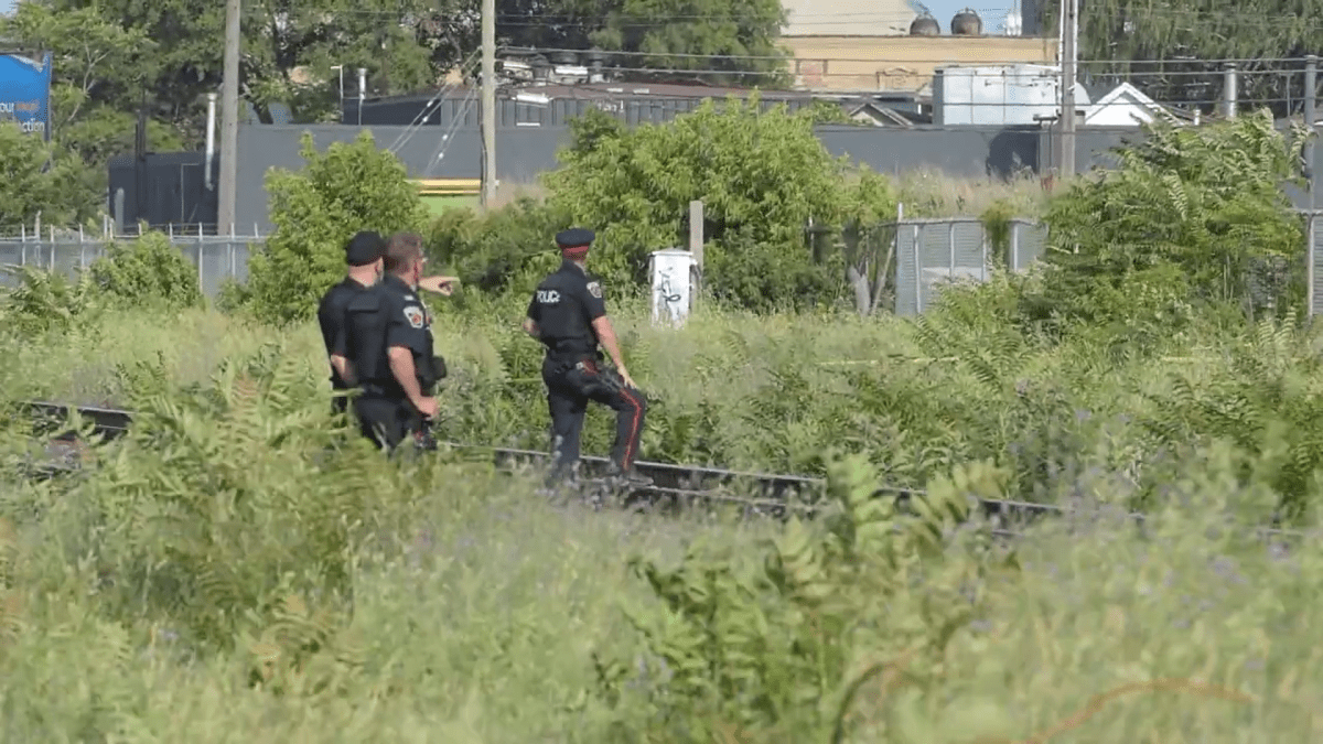 Hamilton Police on scene in the area of Lottridge Street and Landsdowne Avenue where a body was found July 11, 2022. Detectives have charged a Hamilton man with second-degree murder in connection with the discovery.