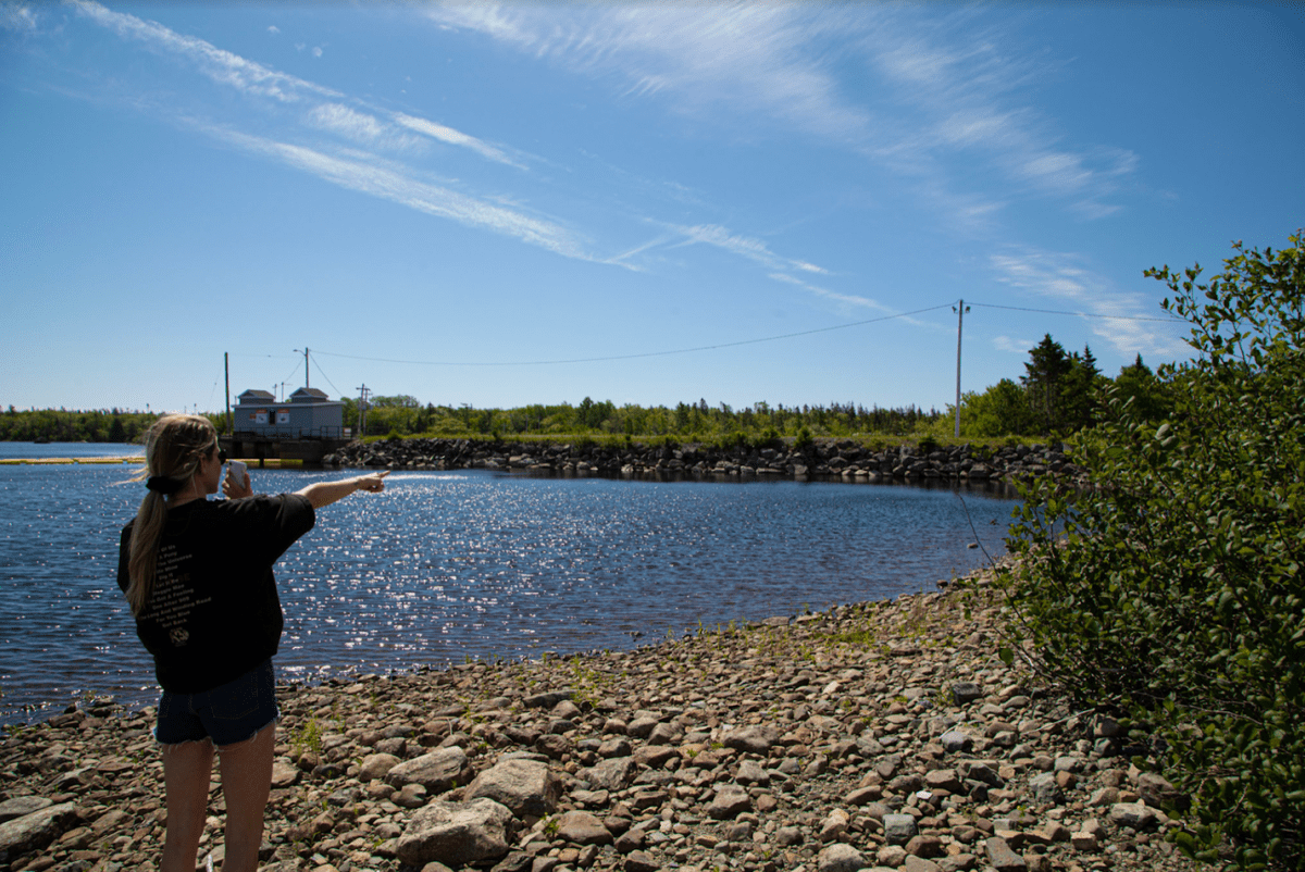 Nicole Gnazdowsky visits the Marshall Falls beach, near Nova Scotia Power’s Sheet Harbour hydro dam, where her brother drowned.