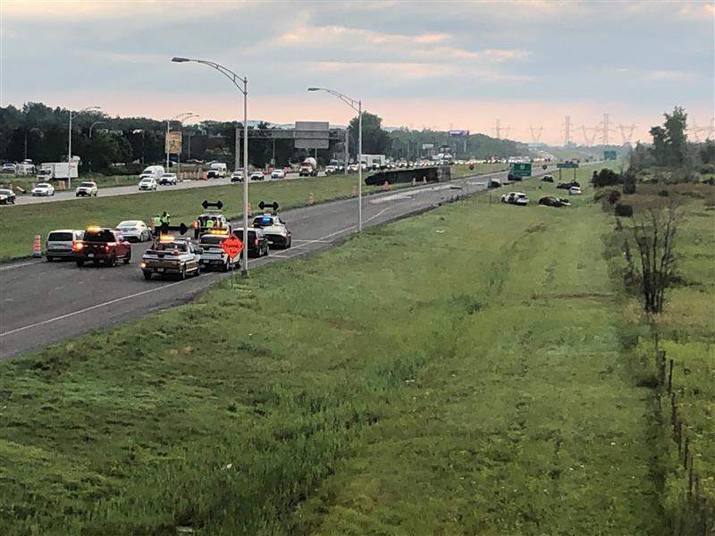 Emergency responders at the scene Wednesday morning of a large crash that has left 2 people dead. 