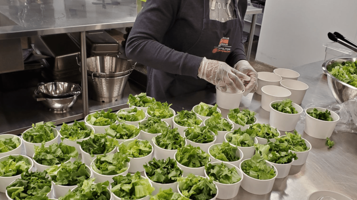 An executive with the Neighbour to Neighbour centre, managing a community food stream, says it will be scrambling to find alternative sources of funding after a city community service program was overwhelmed with requests for help.