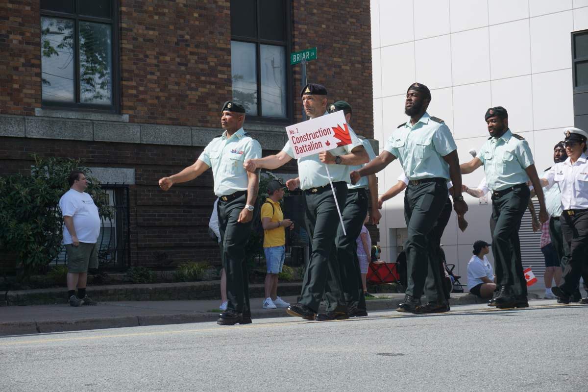 People march in the parade in Halifax on Canada Day.