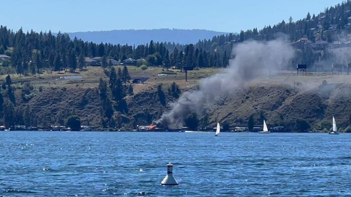 Flames and smoke can be seen from a fire on Tuesday afternoon in West Kelowna.
